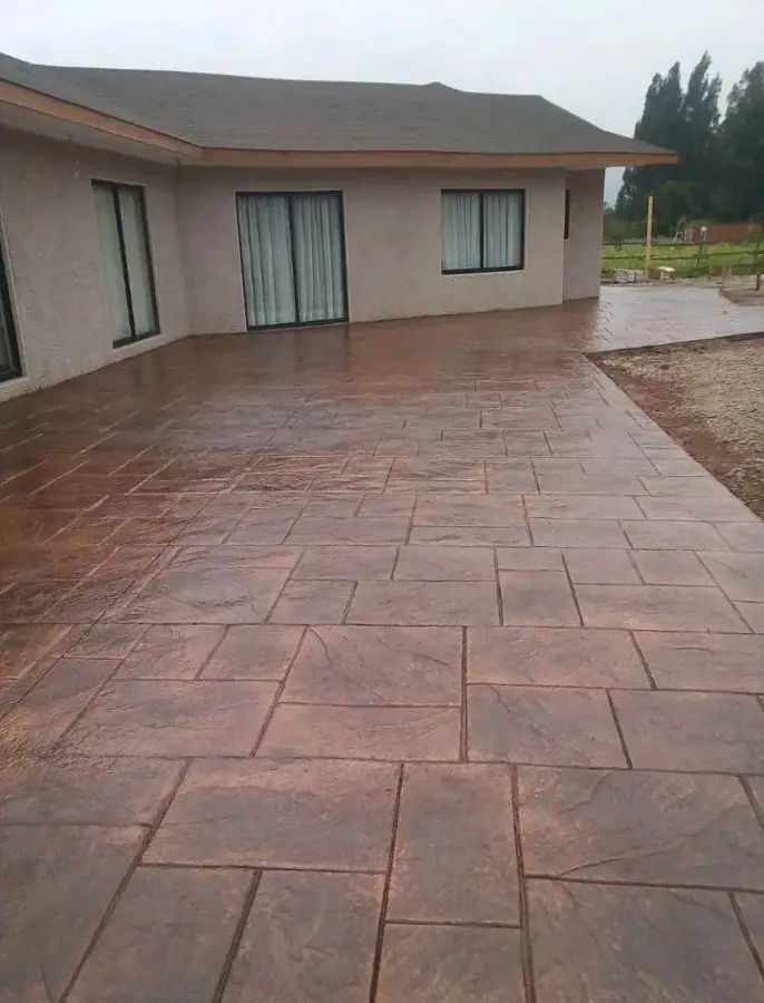 Terraza residencial en tono terracota (Terraza)